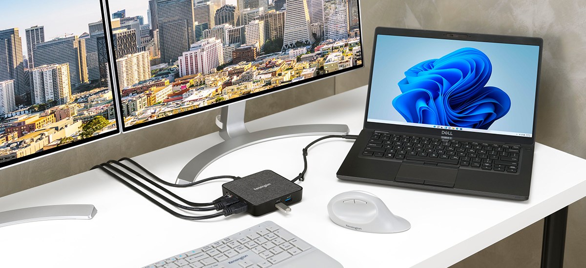 MD120U4 USB4 Portable Dock connected to a laptop, two monitors, a keyboard and mouse.