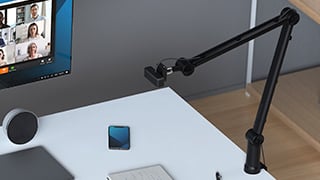 Professional desktop setup showcasing Kensington A1020 Boom Arm with W1050 1080P Fixed Focus Webcam attached
                                        