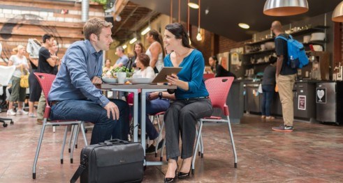 Two people working at a coffee shop