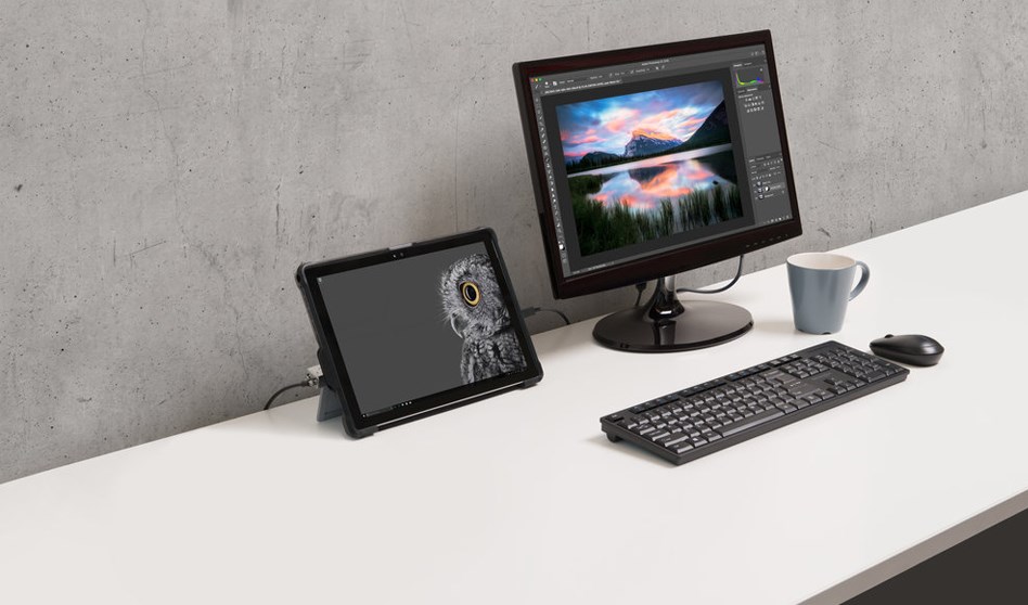 A monitor and a tablet on a desk