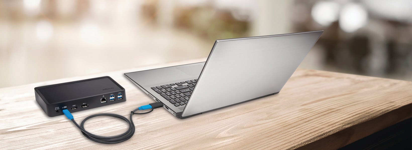 minimalist desk setup docking station on desk