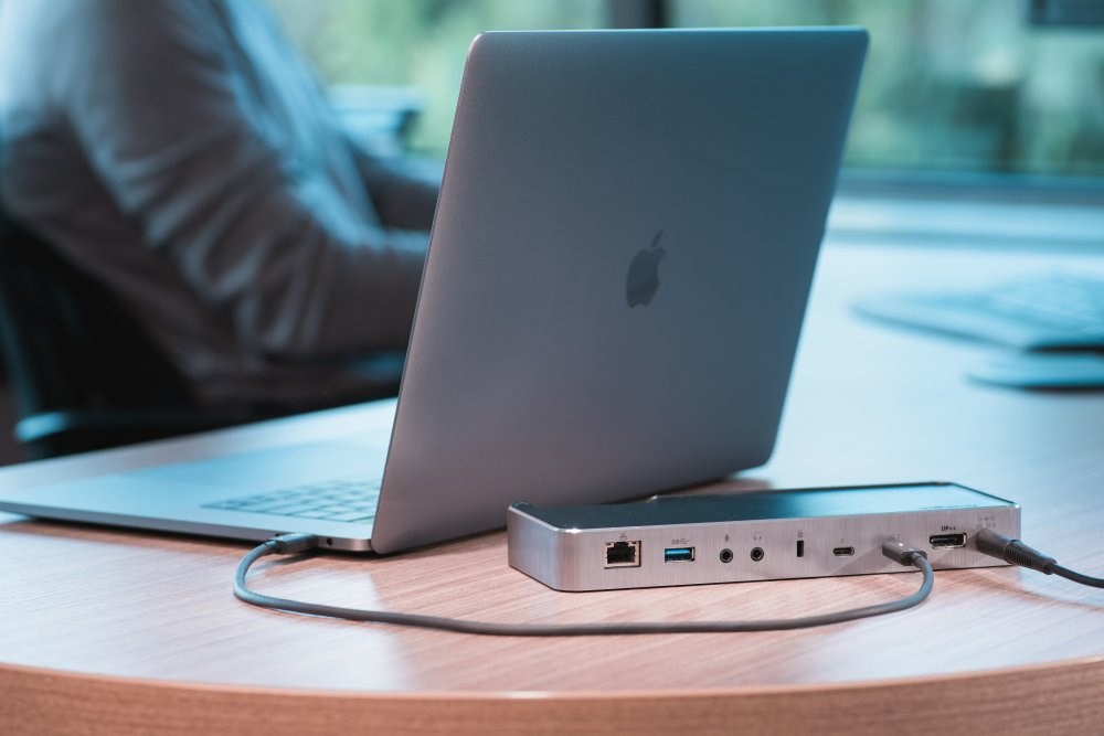 A MacBook connected to a Thunderbolt 3 Universal Docking Station