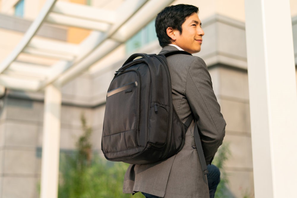 Man wearing a Kensington laptop backpack 