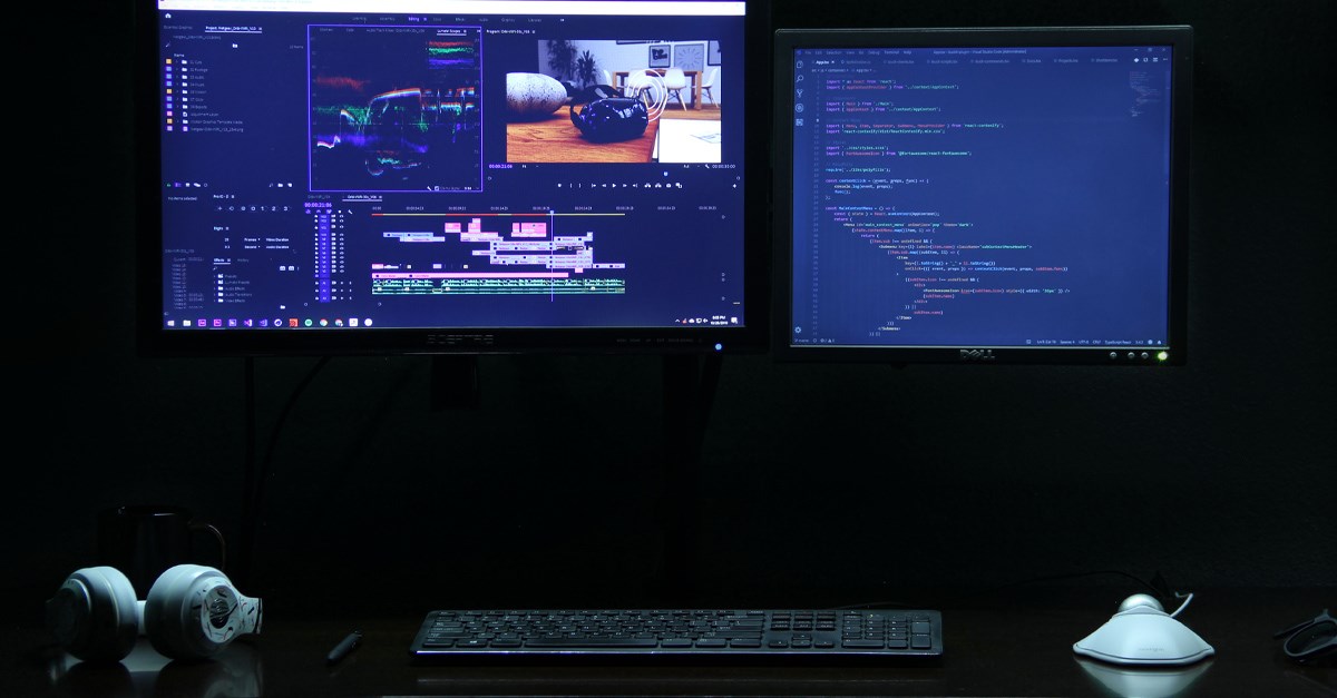Dual monitor desktop setup with a Kensington mouse
