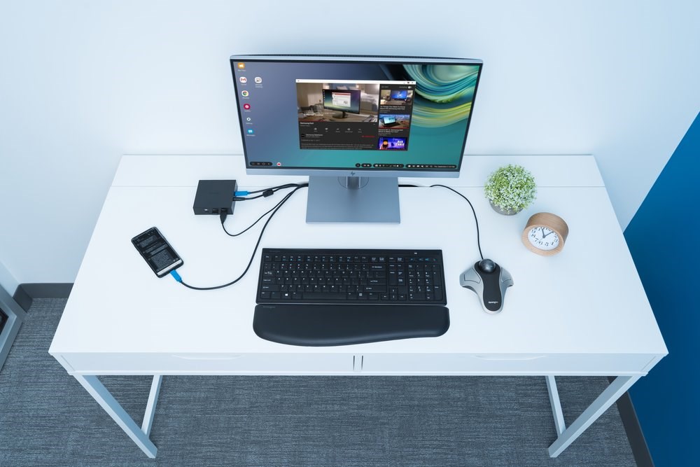 A office computer setup with a Kensington Orbit® Optical Trackball