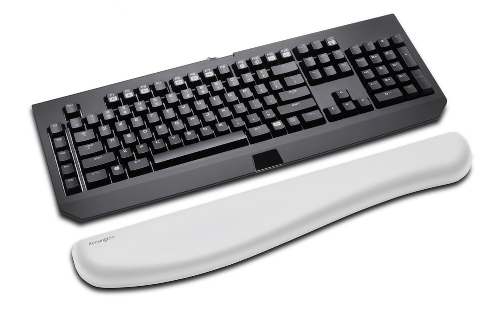 A Kensington ErgoSoft™ Wrist Rest for Mechanical and Gaming Keyboards paired with a gaming keyboard 