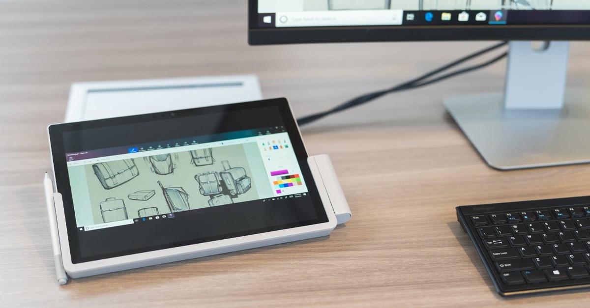 A Microsoft tablet paired with a Kensington docking station