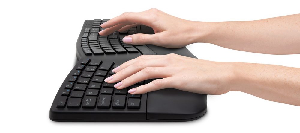 Person using a Kensington Pro Fit® Ergo Wireless Keyboard 