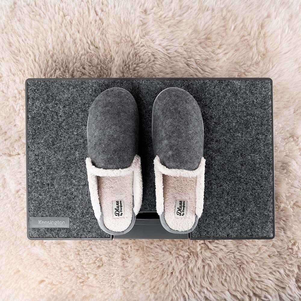 Slippers on top of a Kensington SoleMate™ Pro Ergonomic Footrest