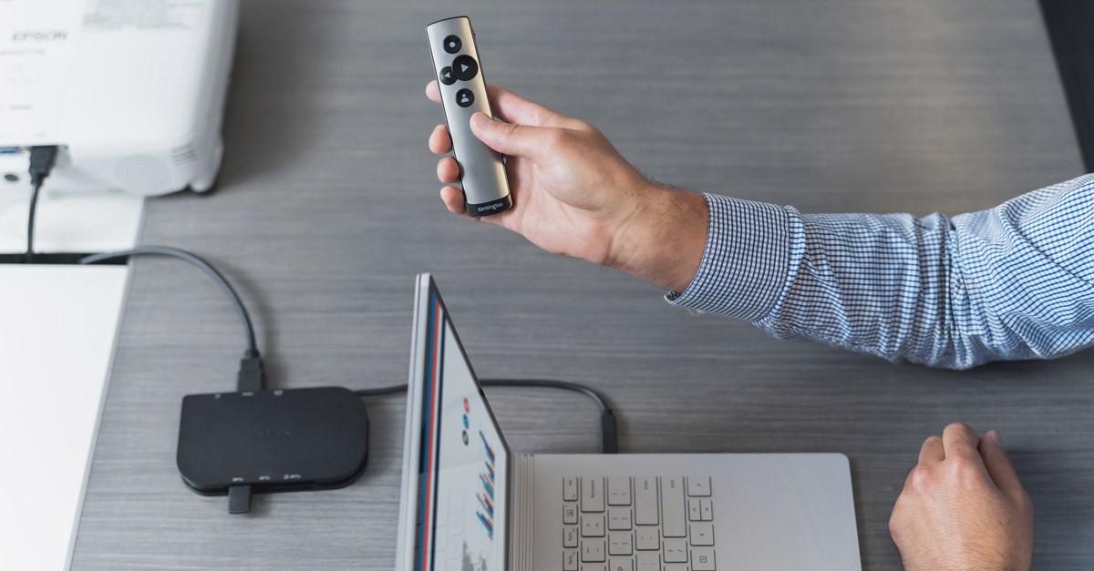 Person holding PowerPointer Presentation Remote with Virtual Laser