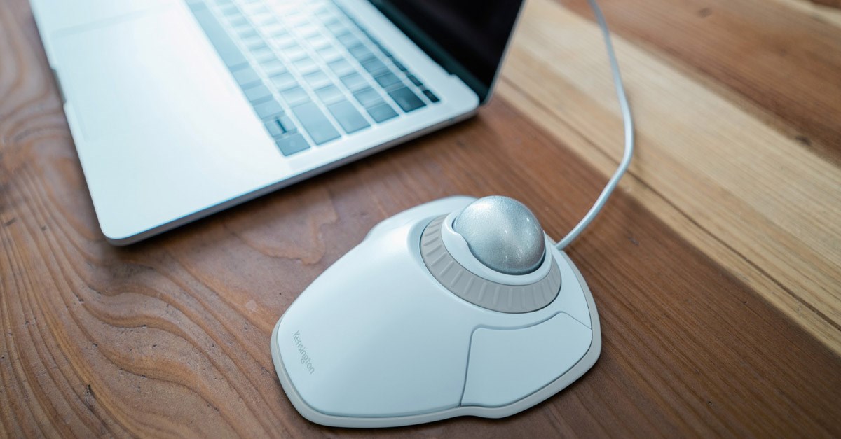 Kensington trackball mouse connected to a laptop