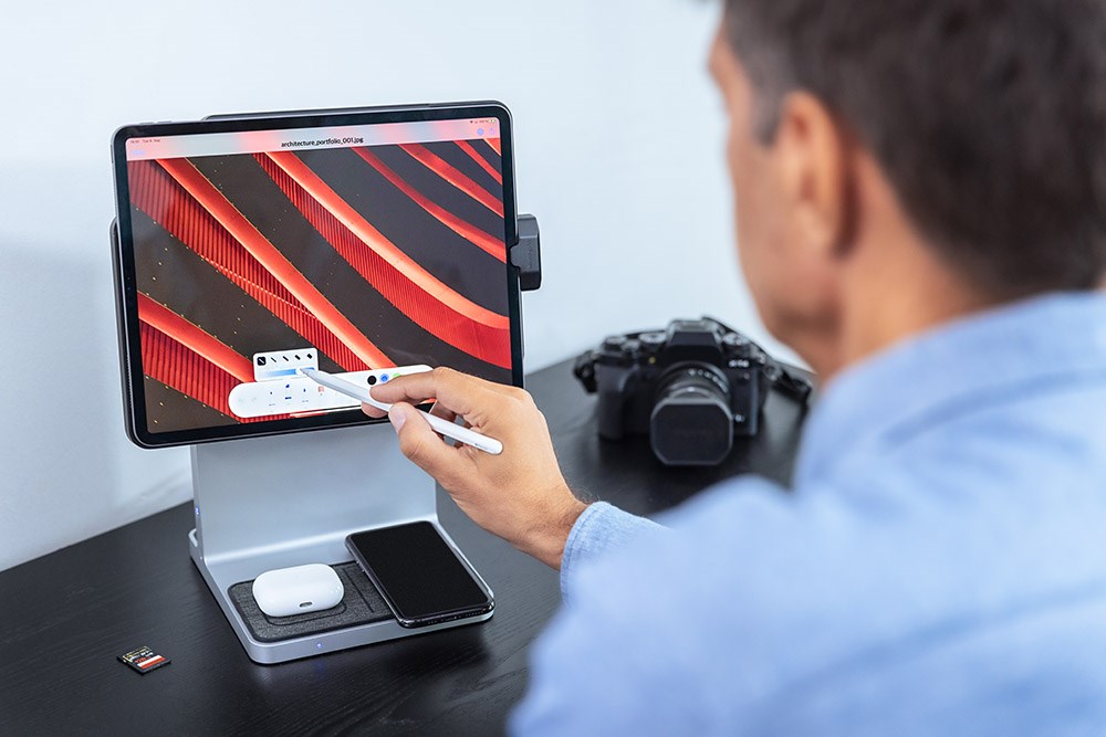 Person using an iPad on a StudioDock