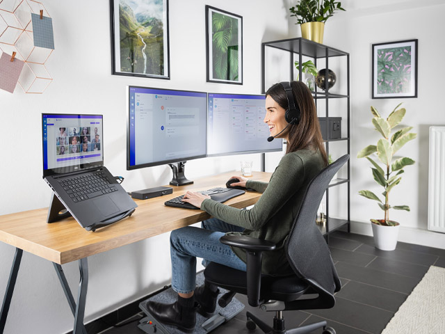 https://www.kensington.com/siteassets/blog/2021/04-april/woman-using-kensington-ergonomic-solutions.jpg