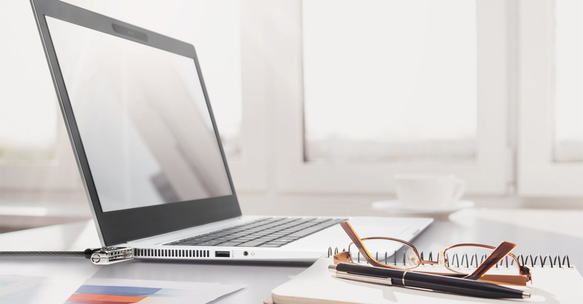 Laptop on desk using NanoSaver lock