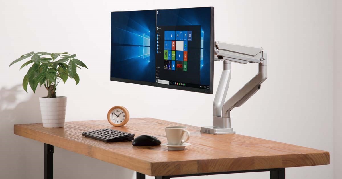 Kensington Monitor Arm attached to desk