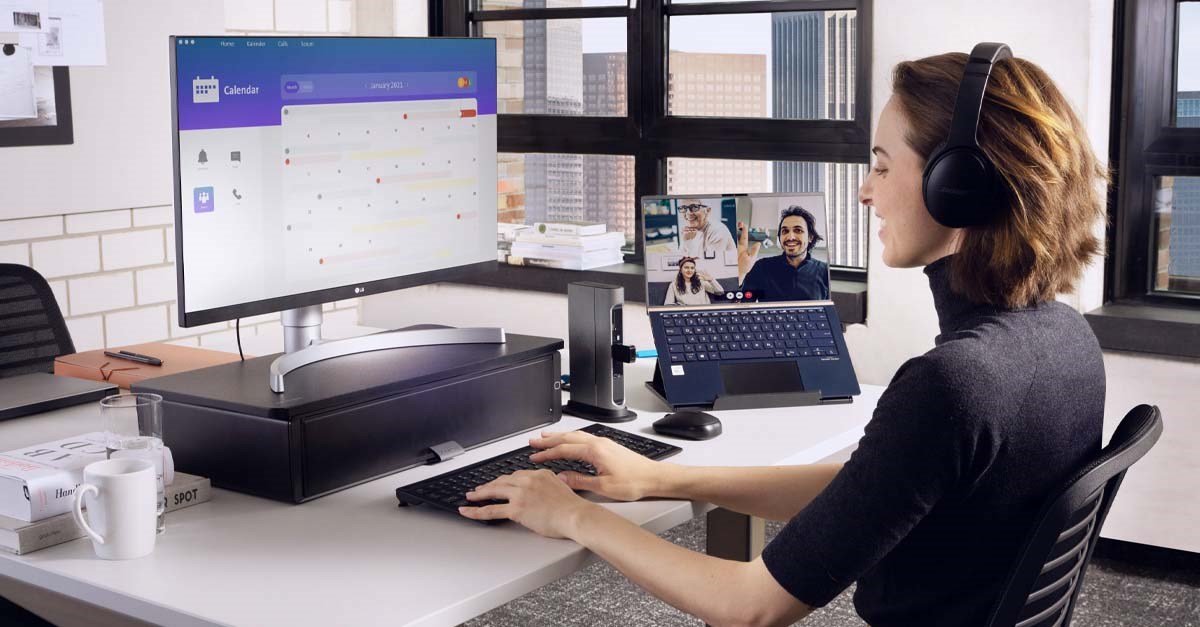 Woman working at desk with UVStand