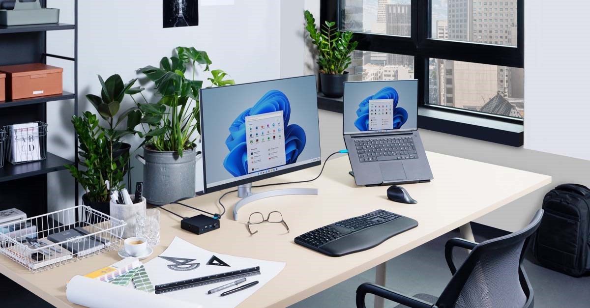 Desk with Windows 11 on computer and Kensington accessories