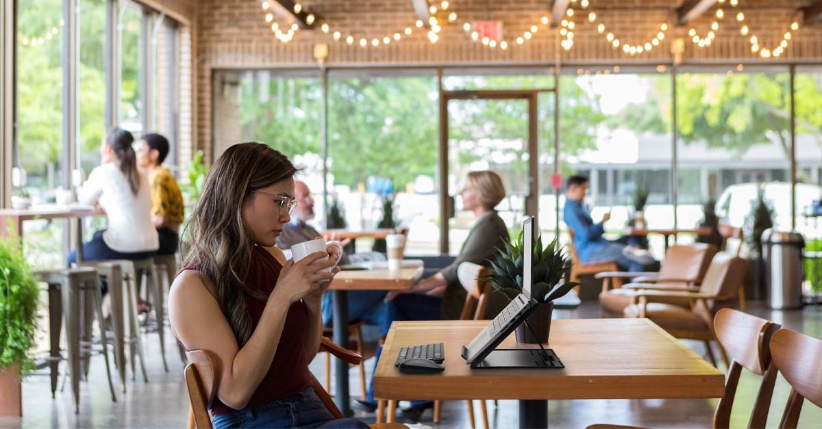 Woman working from coffee shop