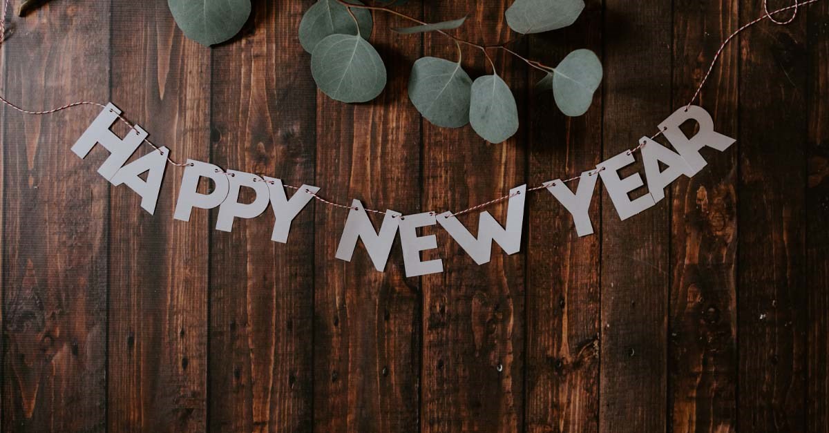 Happy New Year sign on table