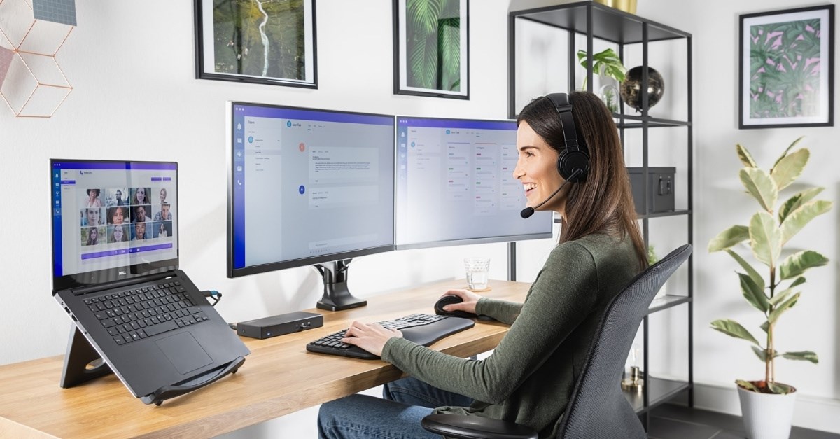 Women infront of desk set up with Ergonomic Kensington tech products