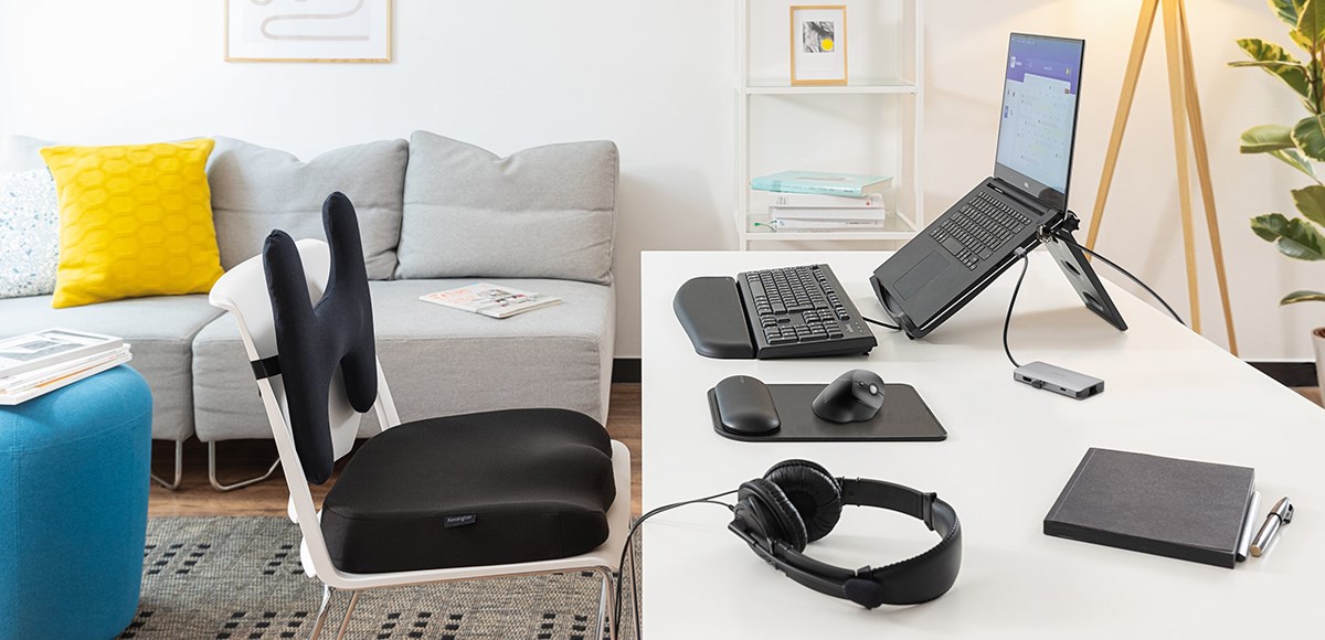 Home office desk with ergonomic Kensington products