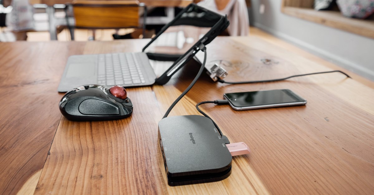 Mobile office set up with a Kensington trackball and docking station