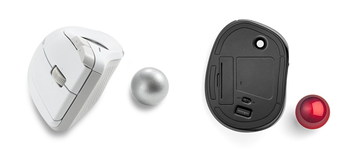 Two Kensington trackballs with the motion ball removed.