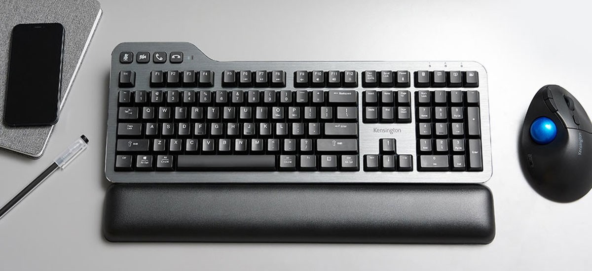 Kensington Mechanical Keyboard and trackball on a white desk