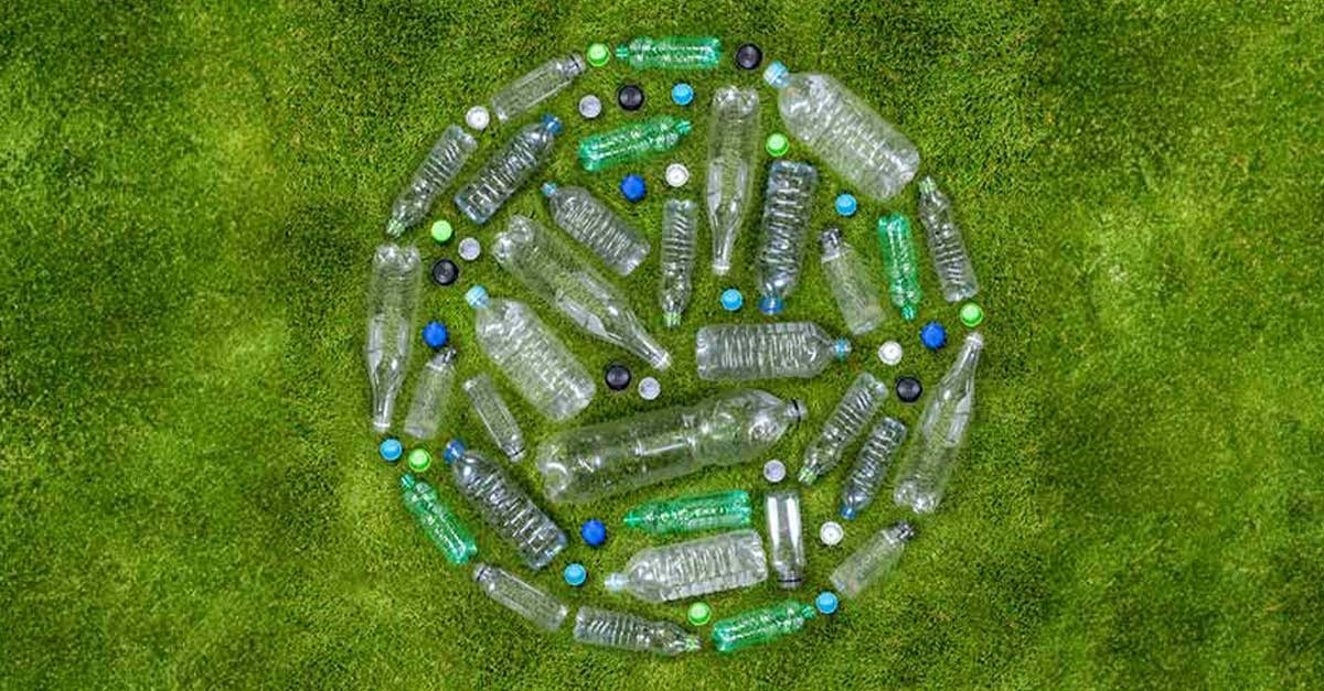 Plastic bottles on grass