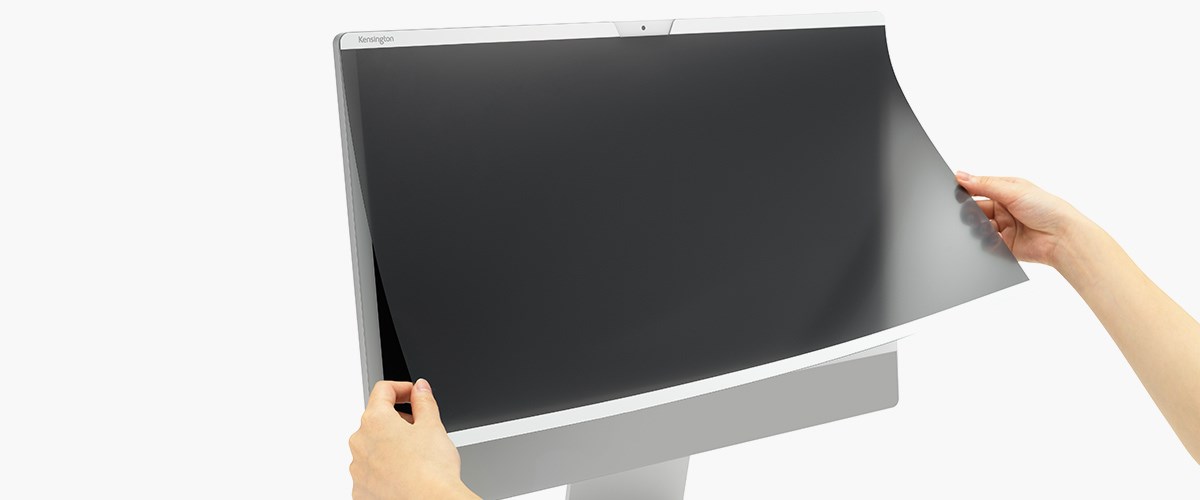  A privacy screen is placed on a desktop computer.