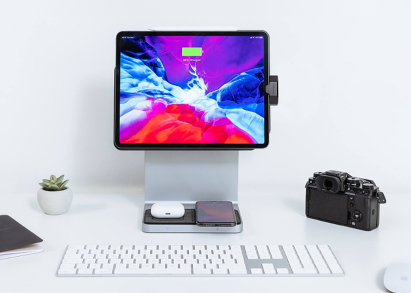 StudioDock and kensington products on desk with a white background.