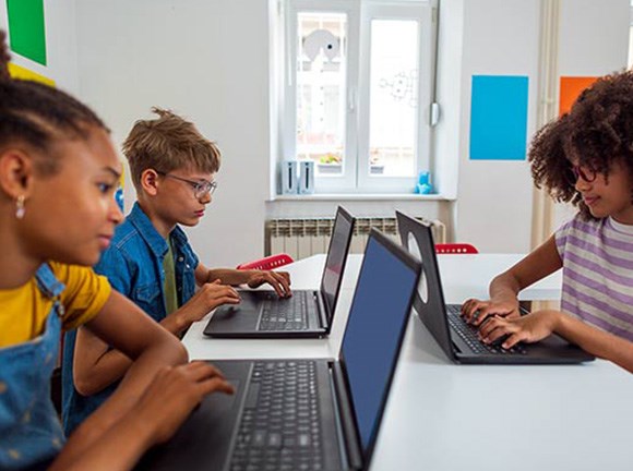 Kids using their laptop to study.