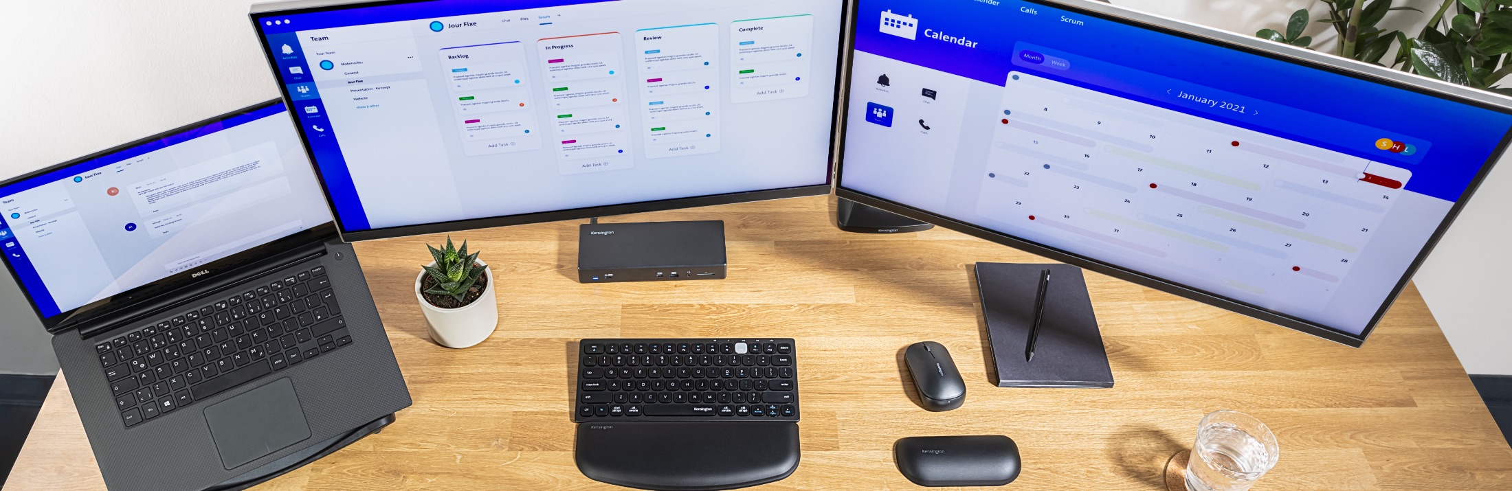 Desktop with Kensington keyboard, wrist rest, mouse, and docking station
