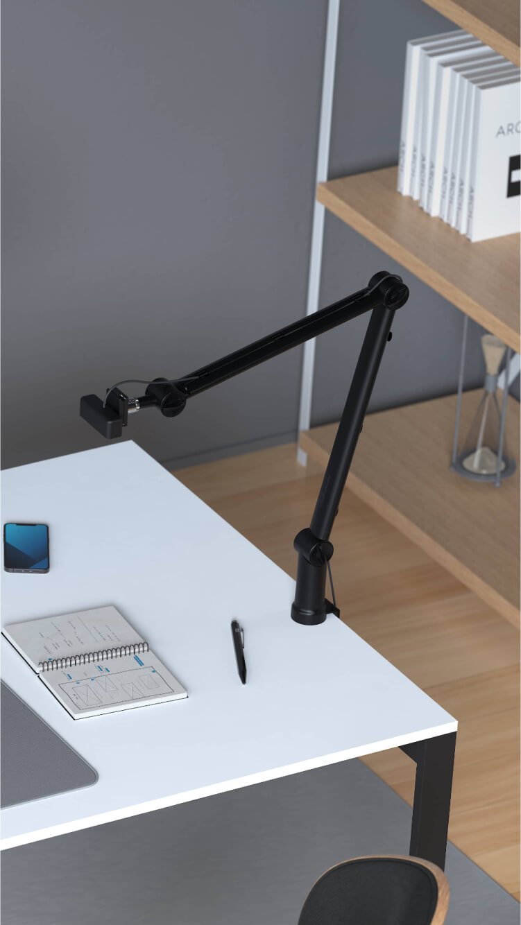 Professional desktop setup with Kensington A1020 Boom Arm attached to desk
                                