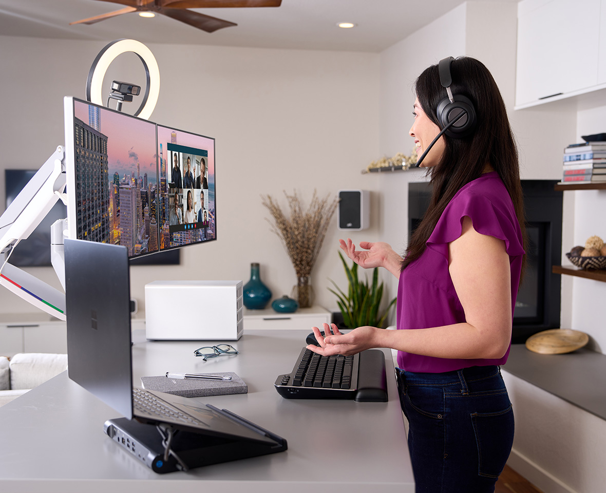 Woman in a virtual meeting with a Kensington H3000 headset