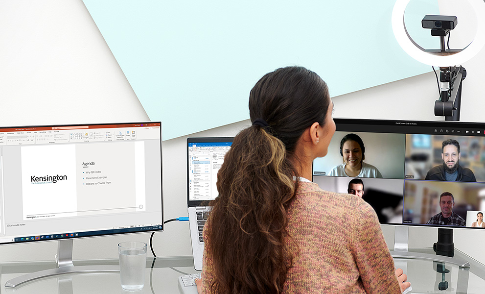Woman on a virtual meeting using a Kensington web camera and ring light