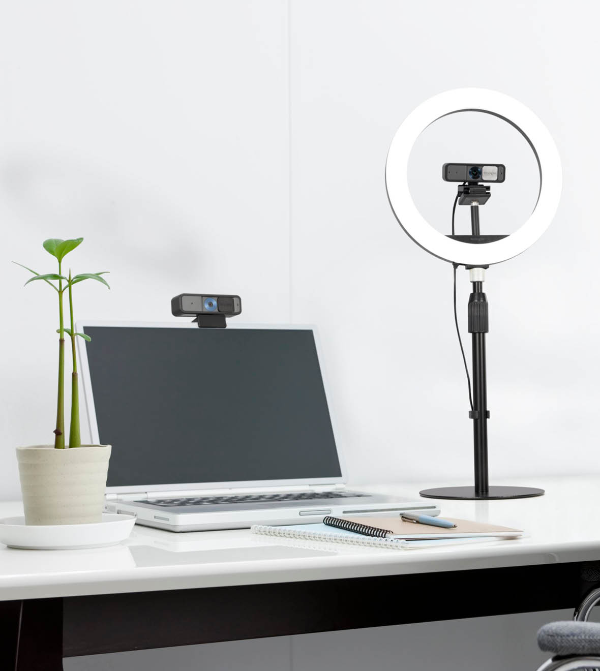 Kensington Ring Light on desk with a webcam and next to a laptop