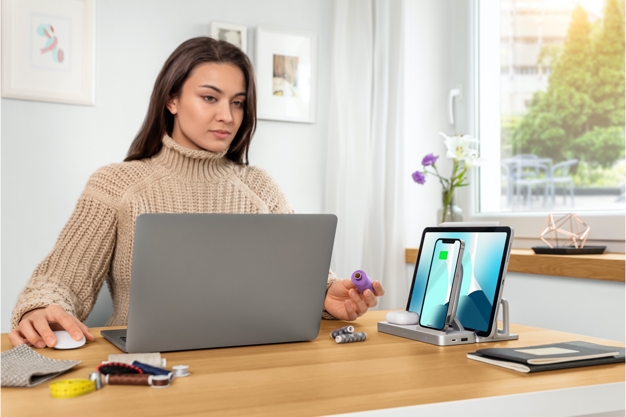 woman using computer next to StudioCaddy