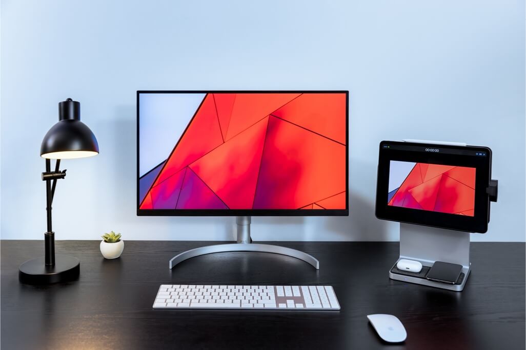 StudioDock on desk next to monitor