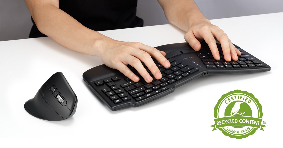 Person typing on a Kensington black ergonomic split keyboard next to a vertical ergonomic mouse on a white desk. A 'Certified Recycled Content' badge by SCS Global Services is displayed in the bottom right corner.
