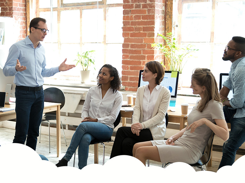 Man giving presentation to small group