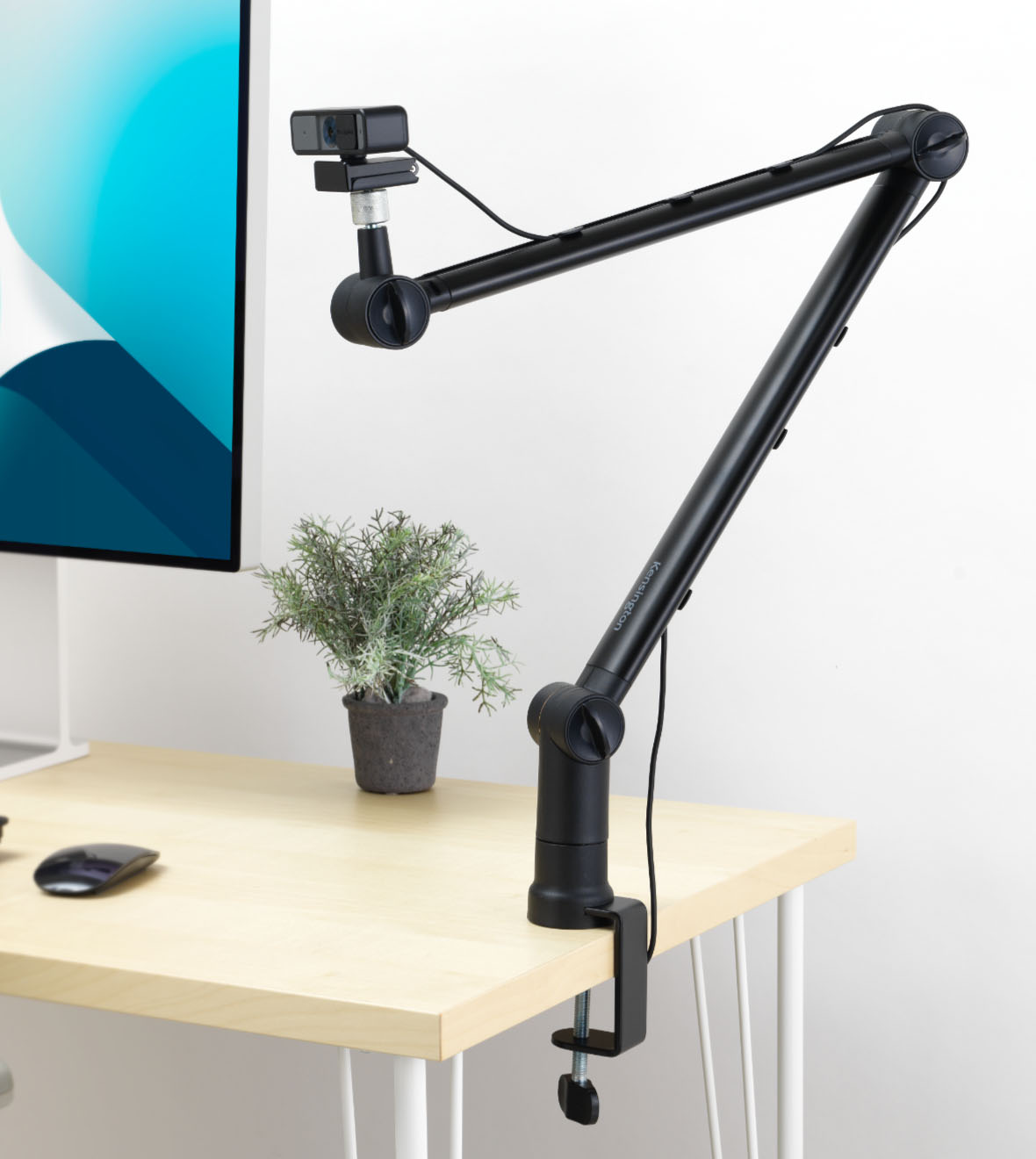 A1020 Boom Arm connected to desk
