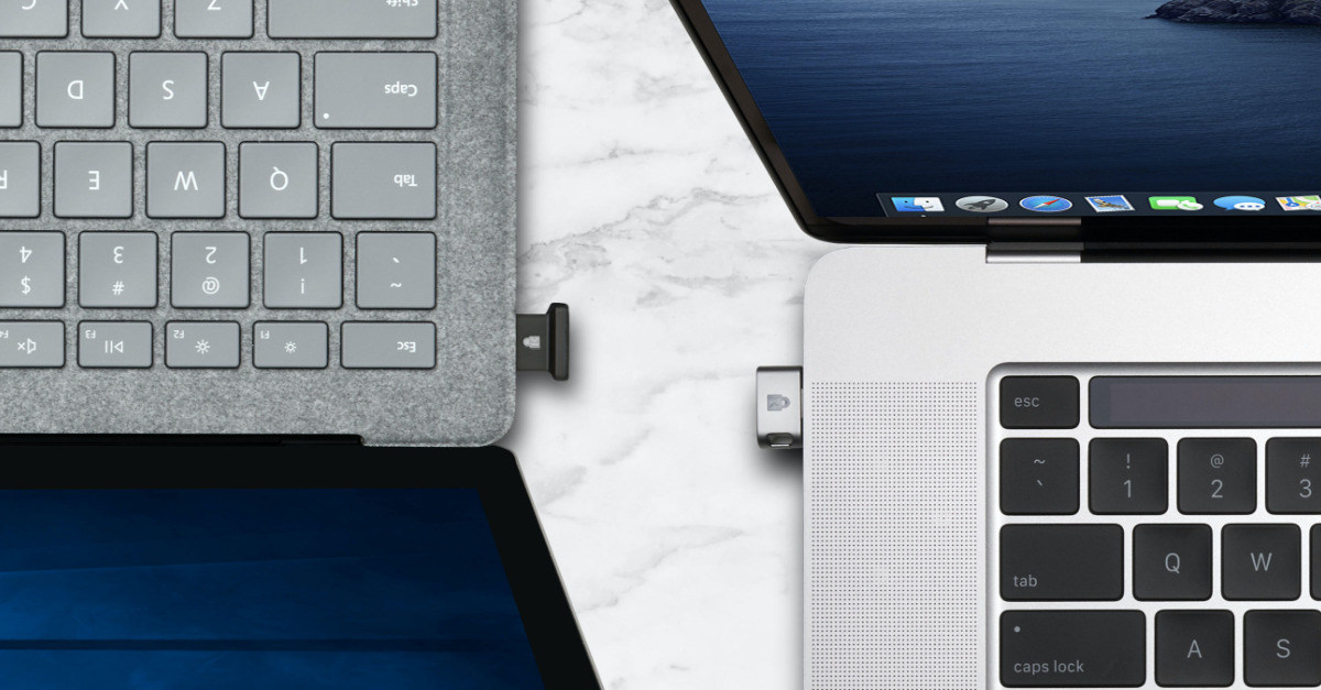 Zoom on a Windows laptop with VeriMark™ Guard USB-A fingerprint key on top of a tabletop