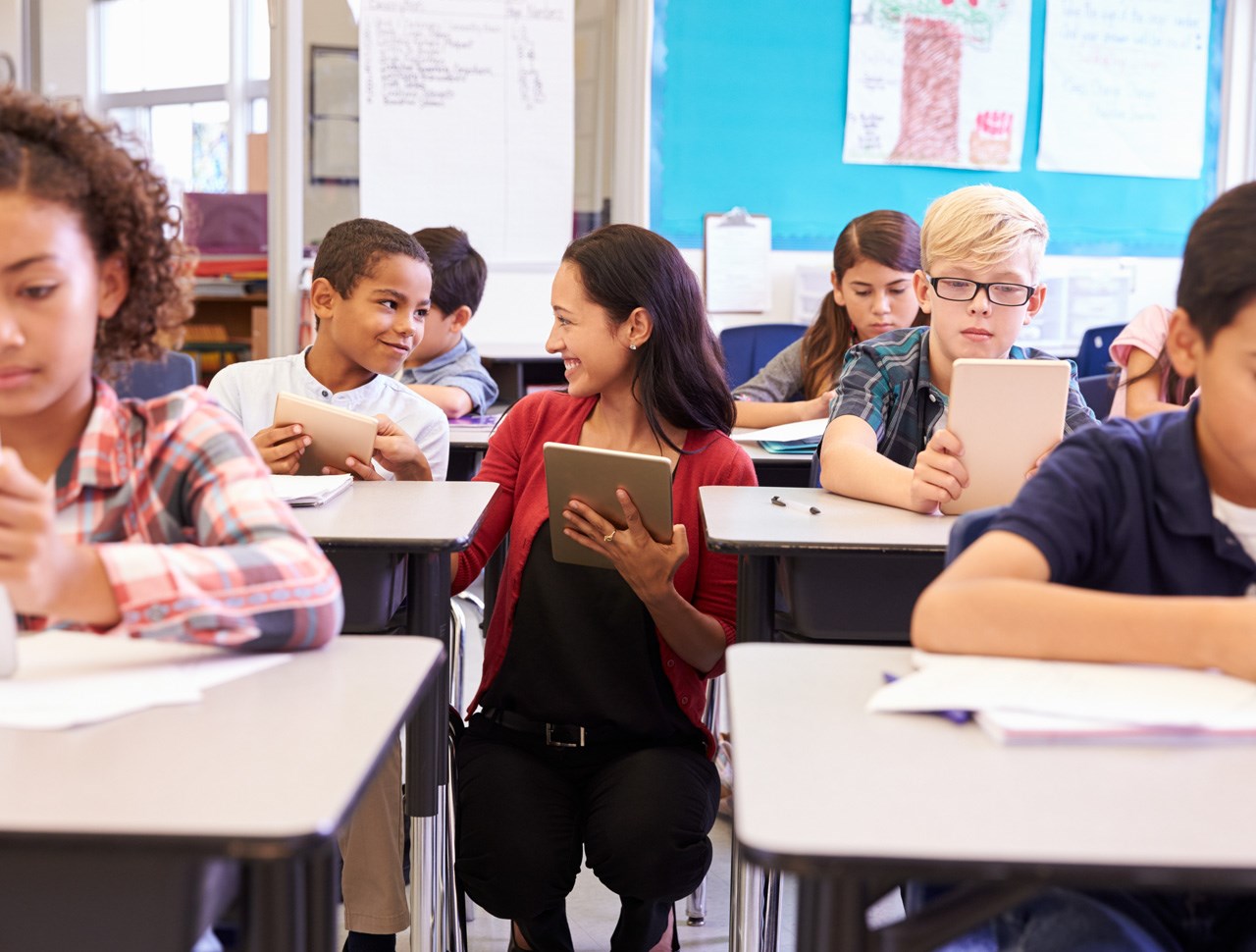 Woman helping student