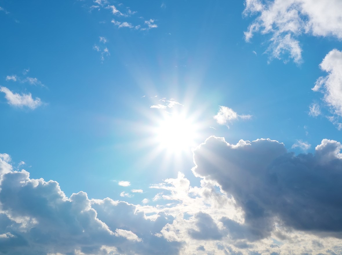 Blue sky with bright sun.