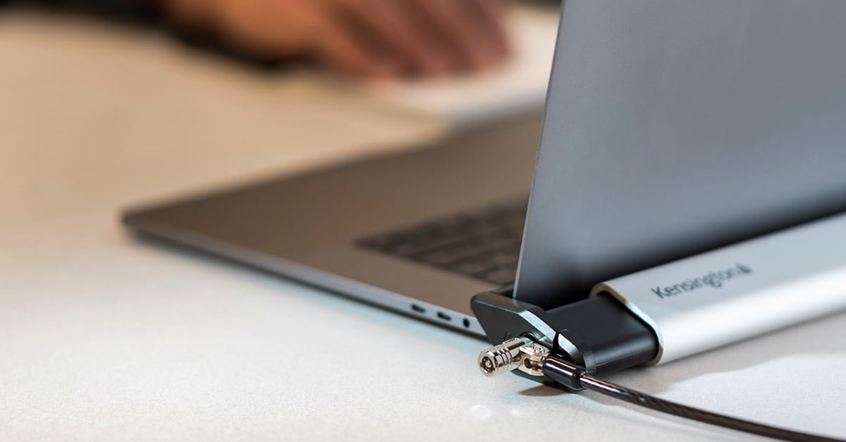 Closeup of a Kensington laptop lock connected to a laptop