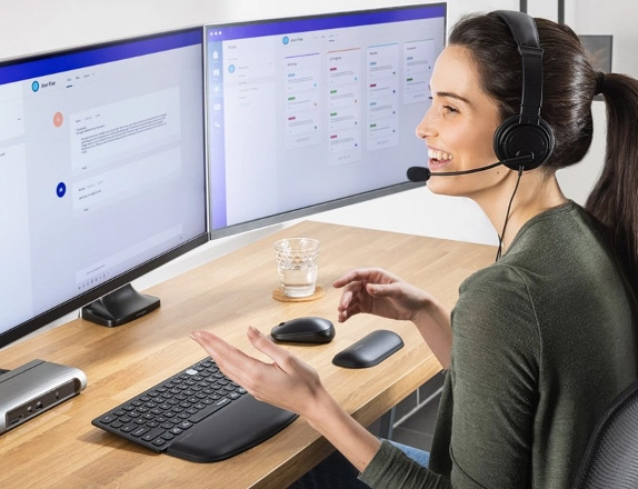 Woman working at home with Kensington products